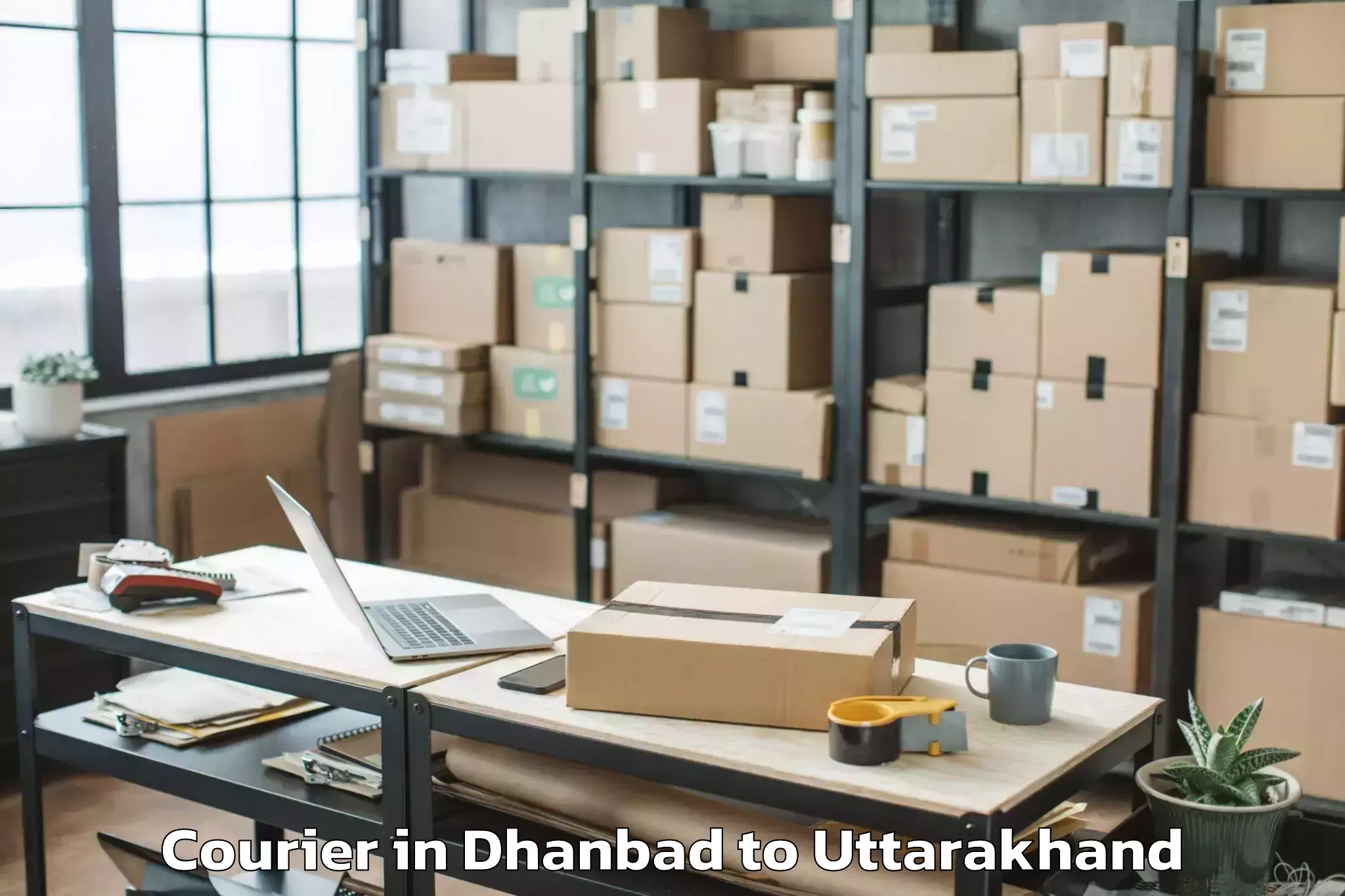 Easy Dhanbad to Bhanoli Courier Booking